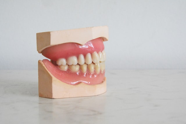 THE ROLE PLAYED BY DENTAL CROWNS